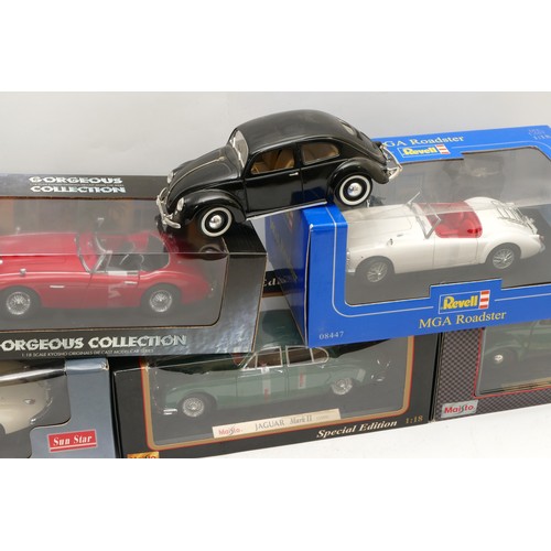 131 - Diecast model cars, comprising five boxed 1:18 scale models, to include a Sun Star Jaguar XK140 coup... 