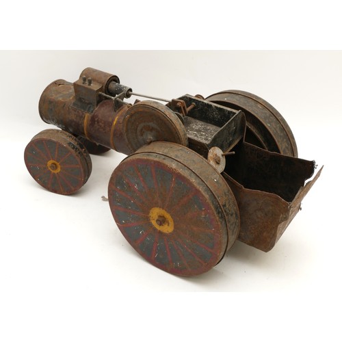 157 - A tinplate steam engine/roller toy, circa 1930s,
lithographed main body in red, black and yellow, pl... 