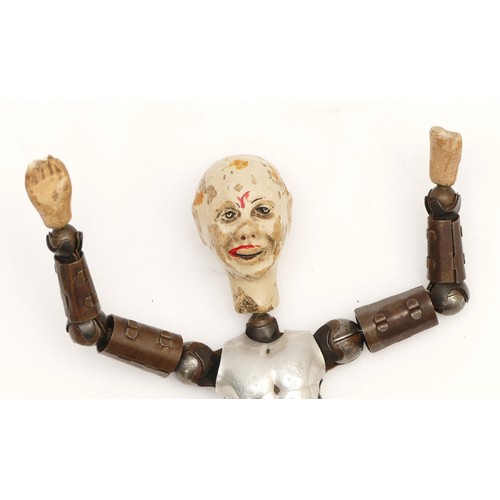 167 - An early 20th century Bucher (Switzerland) articulated figure, having metal body and limbs with comp... 