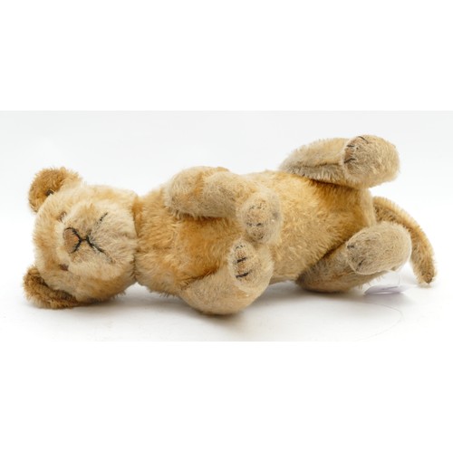 168 - An early 20th century jointed golden mohair Lion, attributed to Steiff (Germany), button to ear, amb... 