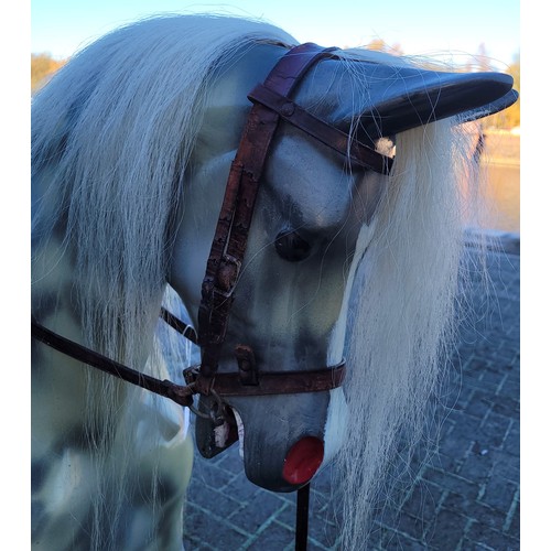 172 - A mid 20th century 'Haddon Rockers' cantilever rocking horse, dapple painted fibreglass, with horse ... 