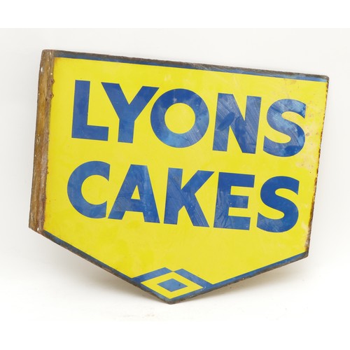 181 - A mid 20th century 'Lyons Cakes' enamel shop sign, double sided, blue lettering on a yellow ground.
... 