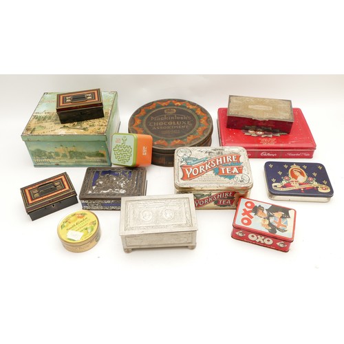 184 - A collection of mid 20th century and later advertising tins, to include Oxo Cubes, various biscuit, ... 