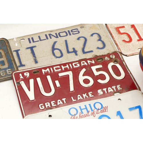 193 - A selection of five pressed metal U.S.A vehicle number plates, circa 20th century, states to include... 