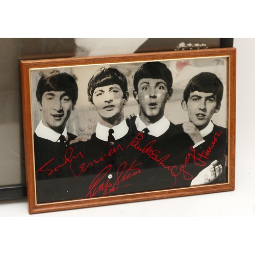 194 - The Beatles memorabilia; To include a framed print of Paul Mccarthy and John Lennon, 67x52cm, a fram... 