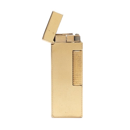 232 - Alfred Dunhill; A Dunhill gold plated rollagas pocket cigarette lighter, engine turned case with rel... 