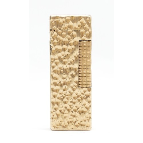 233 - Alfred Dunhill; A Dunhill rollagas gold plated pocket cigarette lighter.