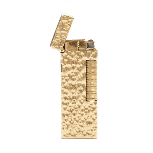 233 - Alfred Dunhill; A Dunhill rollagas gold plated pocket cigarette lighter.