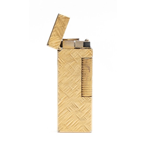 234 - Alfred Dunhill; A Dunhill rollagas pocket cigarette lighter, gold plated having diagonal hash patter... 