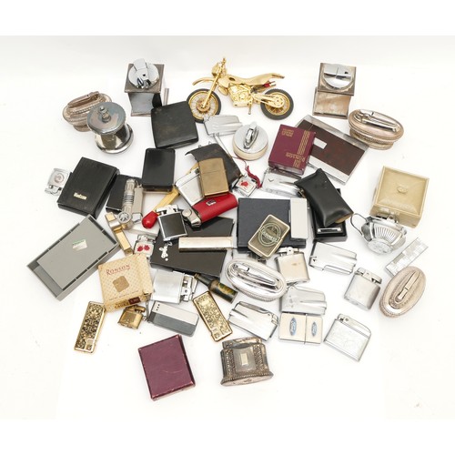 237 - A collection of mid 20th century and later pocket and table cigarette lighters, petrol and gas opera... 