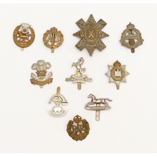 257 - 10x Military cap badges, to include The Welch, East Lancashire and Yorkshire.