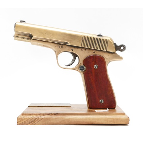 271 - A .45 Rapid fire brass commemorative replica pistol, patented M1 & 2738, based on a plaque presented... 