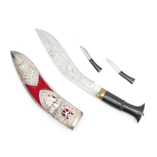 273 - A 20th century dress kukri, detailed with the Chinese dragon along the blade, 27cm with scabbard.