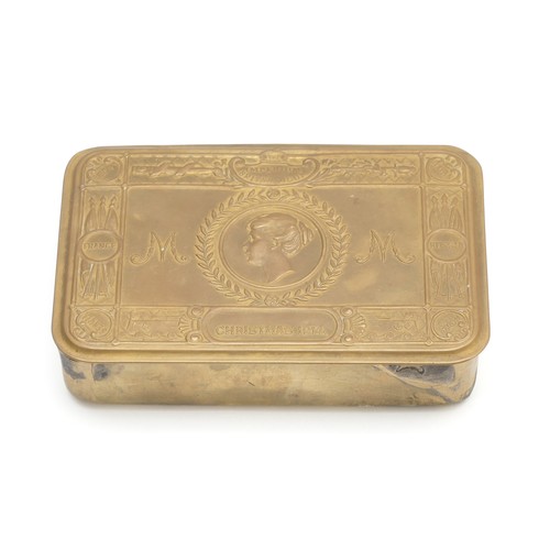 282 - A WW I brass Queen Mary 1914 Christmas tin, 13
x 8.5cm.