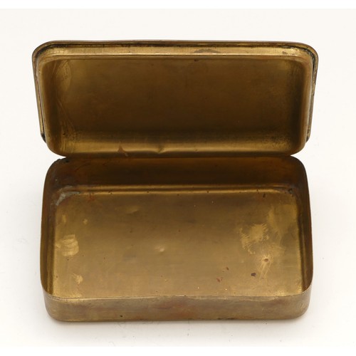 283 - A WW I brass Queen Mary 1914 Christmas tin, 13
x 8.5cm.