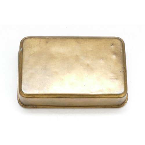 284 - A WWI brass Queen Mary 1914 Christmas tin, 13
x 8.5cm.