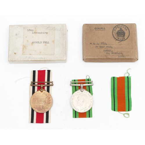 353 - WWII pair of the Special Constabulary Service medal and Defence, presented to 1344 Arnold Fell. Lanc... 