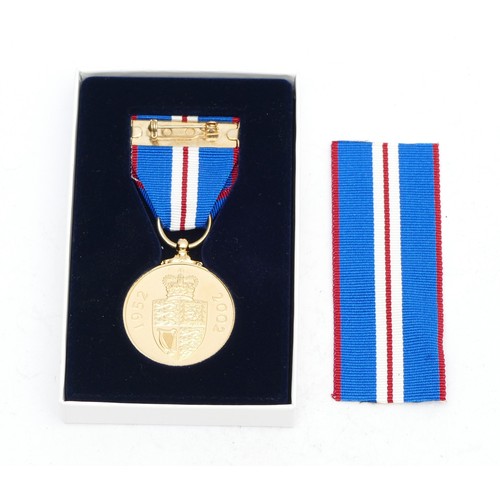 377 - A boxed Elizabeth II Golden Jubilee medal, with spare ribbon.