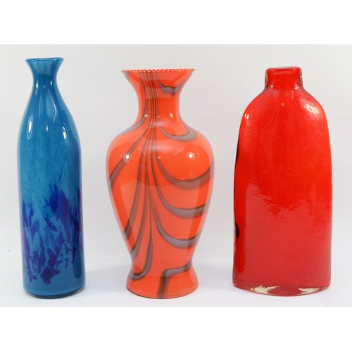 16 - Three hand-blown glass vases, to include, a tall blue bottle vase with a deeper blue splatter effect... 