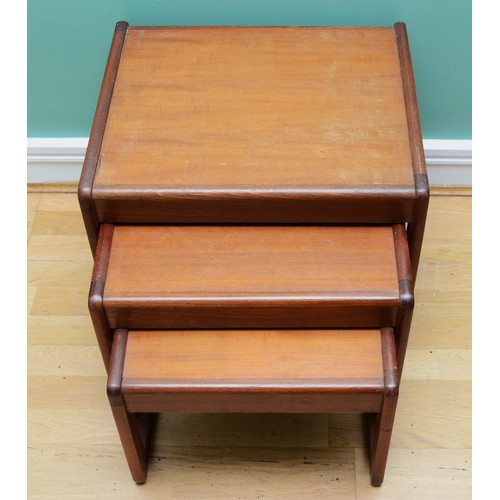 21 - A nest of three mid-century teak side tables, the largest 43cm x 43 x 50, in the style of G Plan. (3... 