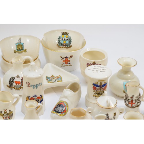 31 - A large quantity of crested china, comprising of seventy-one examples, to include, the regional cres... 