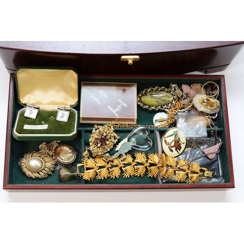 32 - A collection of costume jewellery and coins to include watches, pendants, brooches and a 1950s 