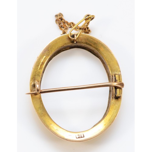 39 - A 9ct gold cameo brooch, with pin and part of a safety chain, 23mm x 19mm inner diameter, 3.6g