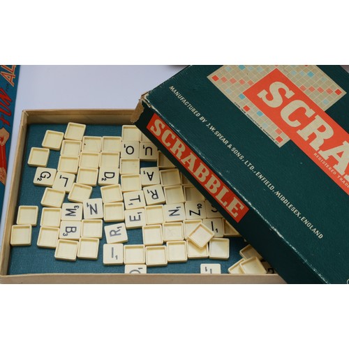 51 - Four vintage board games, to include, a Peter Austin Etch-A-Sketch, in original French-Canadian pack... 