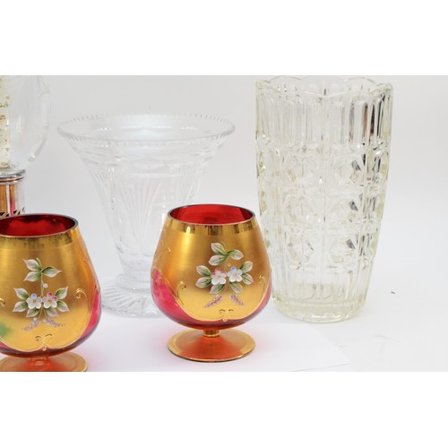 54 - Two brandy glasses, ruby glass with gilt decoration and enamel painted pansies, H-14cm, two opulent ... 