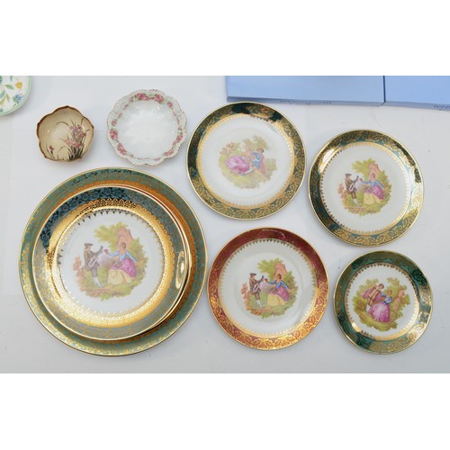 60 - Six Wedgwood decorative plates, five of which are calendar plates from 2003, 2004, 2006, 2002, and 2... 