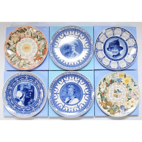 60 - Six Wedgwood decorative plates, five of which are calendar plates from 2003, 2004, 2006, 2002, and 2... 