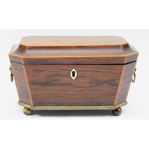 62 - A nineteenth century mahogany sarcophagus tea caddy, inlaid with boxwood accents, bone escutcheon, i... 