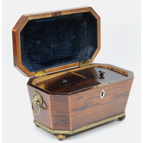 62 - A nineteenth century mahogany sarcophagus tea caddy, inlaid with boxwood accents, bone escutcheon, i... 