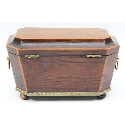 62 - A nineteenth century mahogany sarcophagus tea caddy, inlaid with boxwood accents, bone escutcheon, i... 