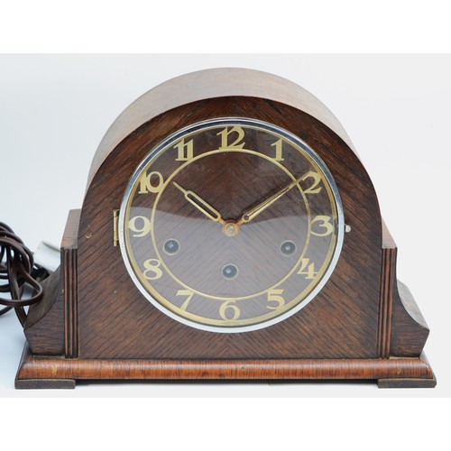 63 - An oak cased mantel clock with an eight-day Haller movement, with Westminster chime, striking on fiv... 