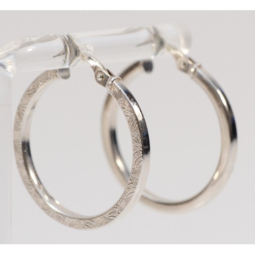 64 - A pair of 375, 9ct white gold hoop earrings, diameter 22mm, 1.8gm.