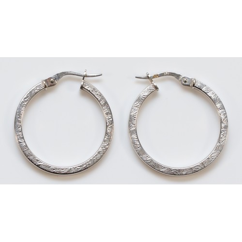 64 - A pair of 375, 9ct white gold hoop earrings, diameter 22mm, 1.8gm.