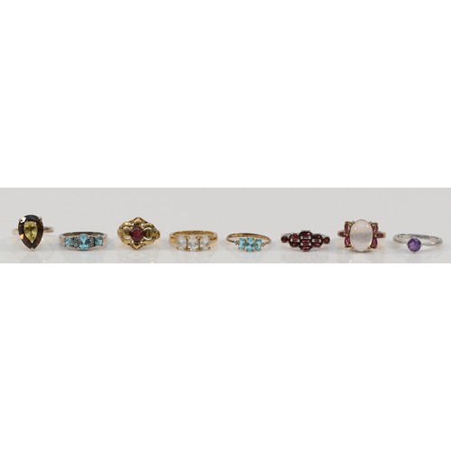 140 - Eight silver and silver gilt and gemstone set rings, including topaz and garnet, L - P, 27gm (8)