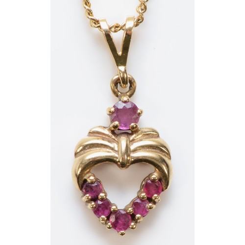 183 - A 9ct gold ruby heart pendant with a chain, 15mm pendant length, 3.8g