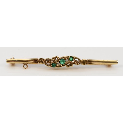 192 - A 9ct gold emerald and diamond brooch, central emerald is cracked, 53mm across, 3.2g