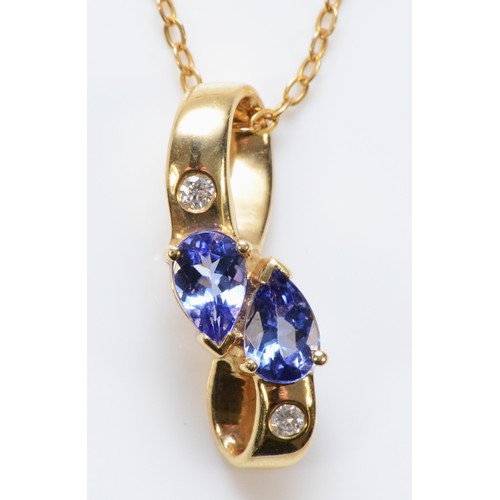 193 - A 14k gold diamond and tanzanite pendant with a 9ct gold chain, 20mm pendant drop, 2.9g