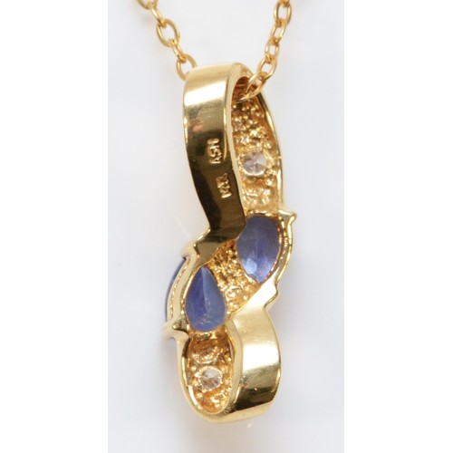 193 - A 14k gold diamond and tanzanite pendant with a 9ct gold chain, 20mm pendant drop, 2.9g