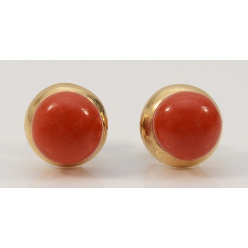 199 - A pair of 9ct gold coral stud earrings with scroll backs, 7mm diameter, 2.4g