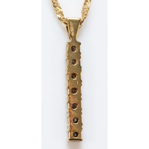 201 - A 9ct gold seven diamond drop pendant, 20mm drop, with a chain, 3.2g