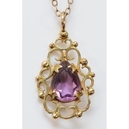 202 - A 9ct gold and amethyst pendant with a chain, 10mm x 6mm amethyst, 2.4g