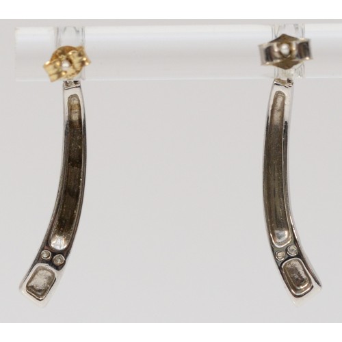 209 - A pair of 9ct white gold and diamond drop earrings, 25mm drop, 1.6g