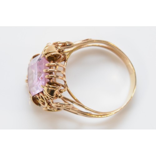 213 - An unmarked 14k rose gold and pink gemstone cocktail ring, possibly continental, 12mm x 10mm gemston... 