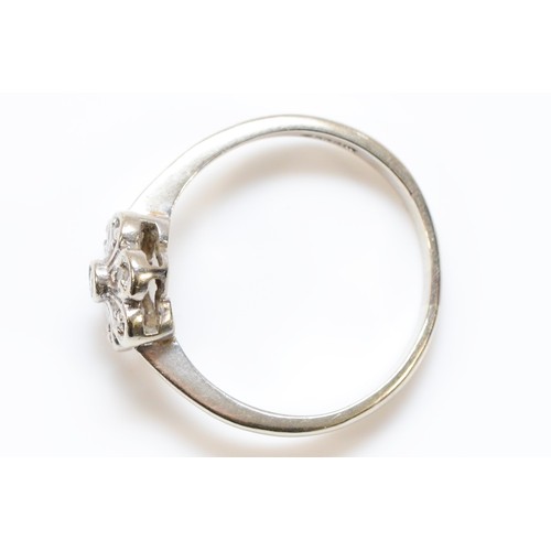 714 - A 9ct white gold diamond floral cluster ring, P, 2.6g