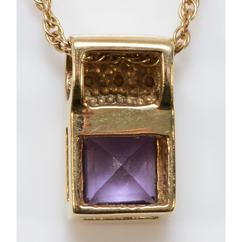 723 - A 9ct gold amethyst and diamond pendant on a chain, 14mm x 8mm pendant, 3.5g