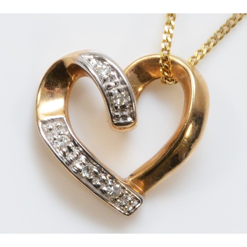 724 - A 9ct gold diamond heart pendant with a chain, 12mm across, 1.6g